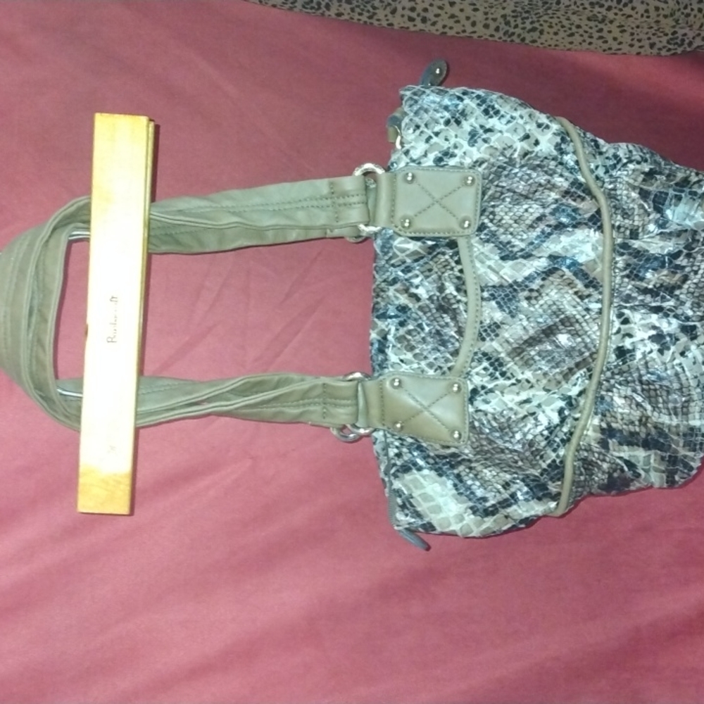 Kathy Van Zeeland Tan animal pattern print purse